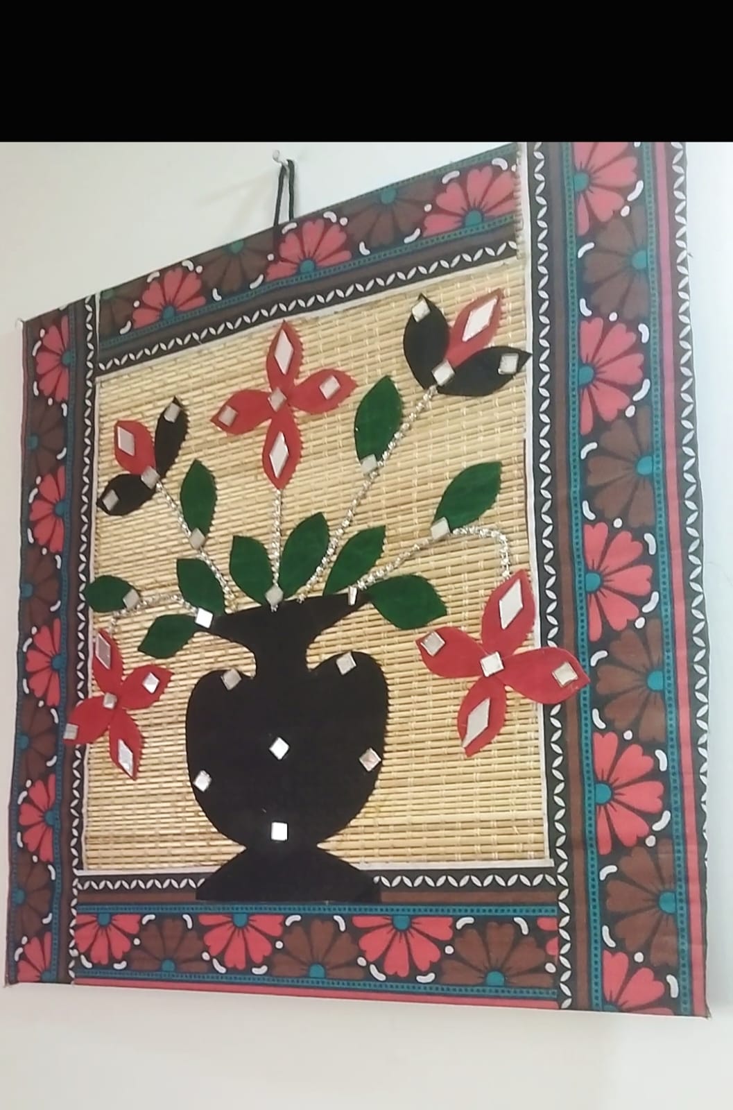 Handcrafted Bamboo Wall Hanging with Flower Pot Design