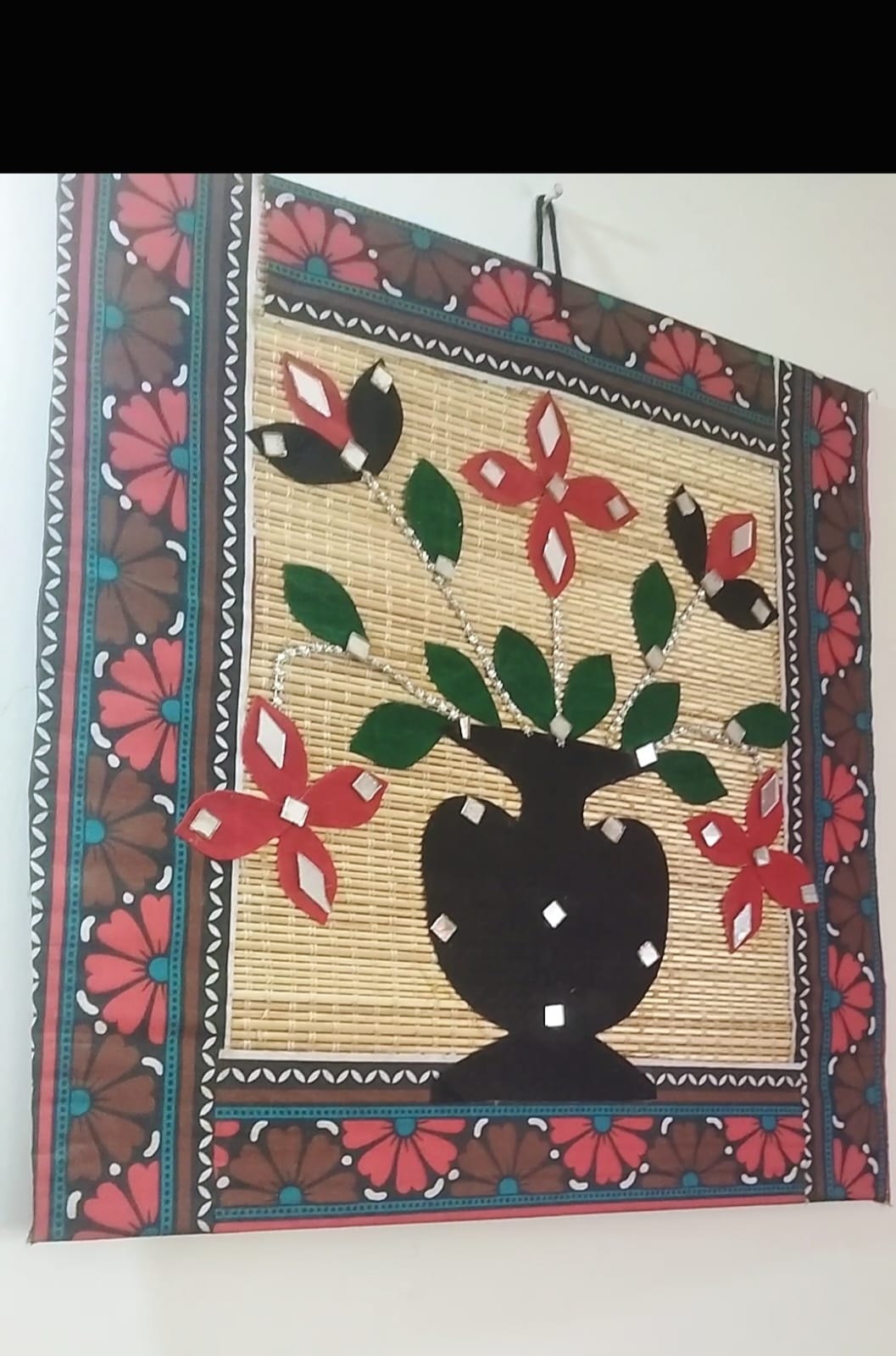 Handcrafted Bamboo Wall Hanging with Flower Pot Design
